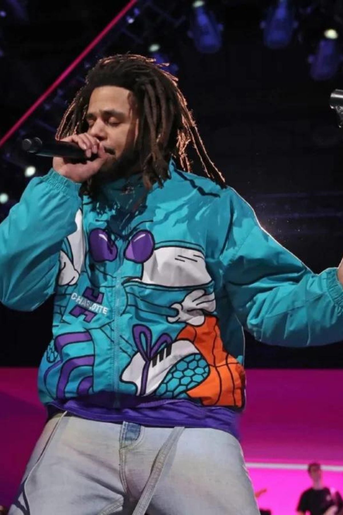J. Cole 90s Char­lotte Hor­nets Blue Hooded Jack­et